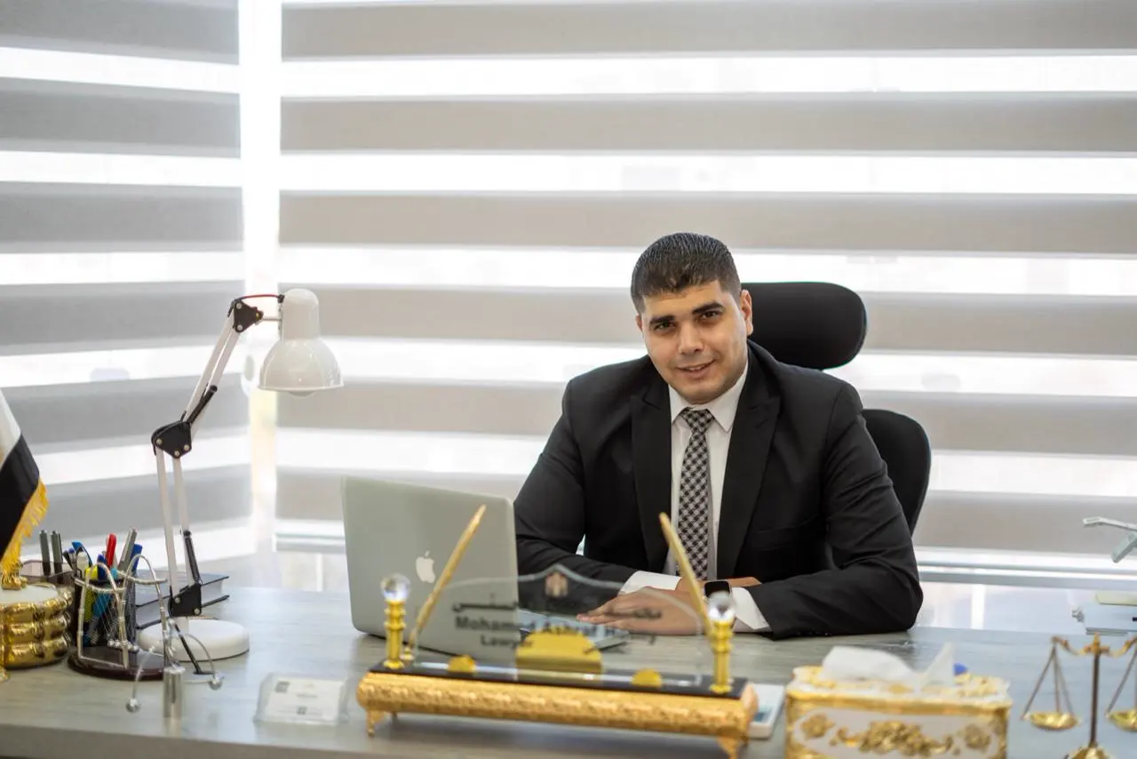 Mohamed Ashraf Hosny, Egyptian lawyer in Cairo, at his office desk